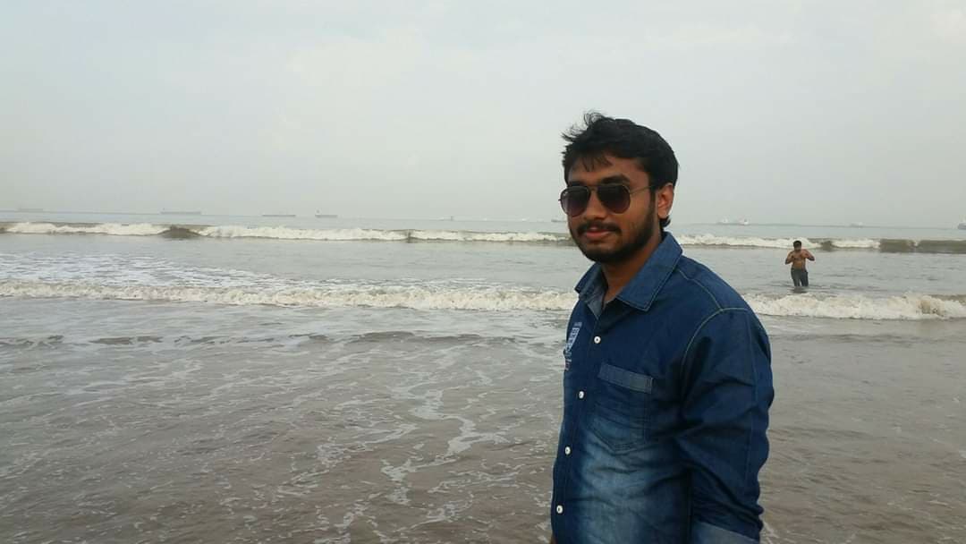 TOZAMMEL HOUQUE ANSARI cricket player photo