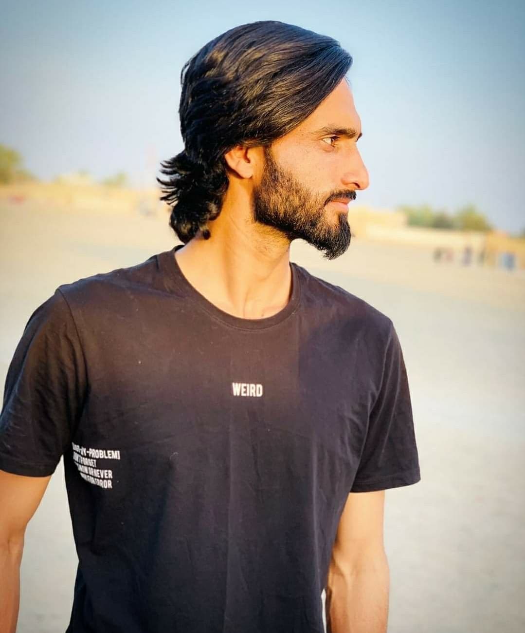 M KHAN